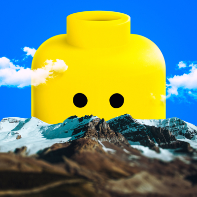 Photo collage of a huge Lego head behind mountains